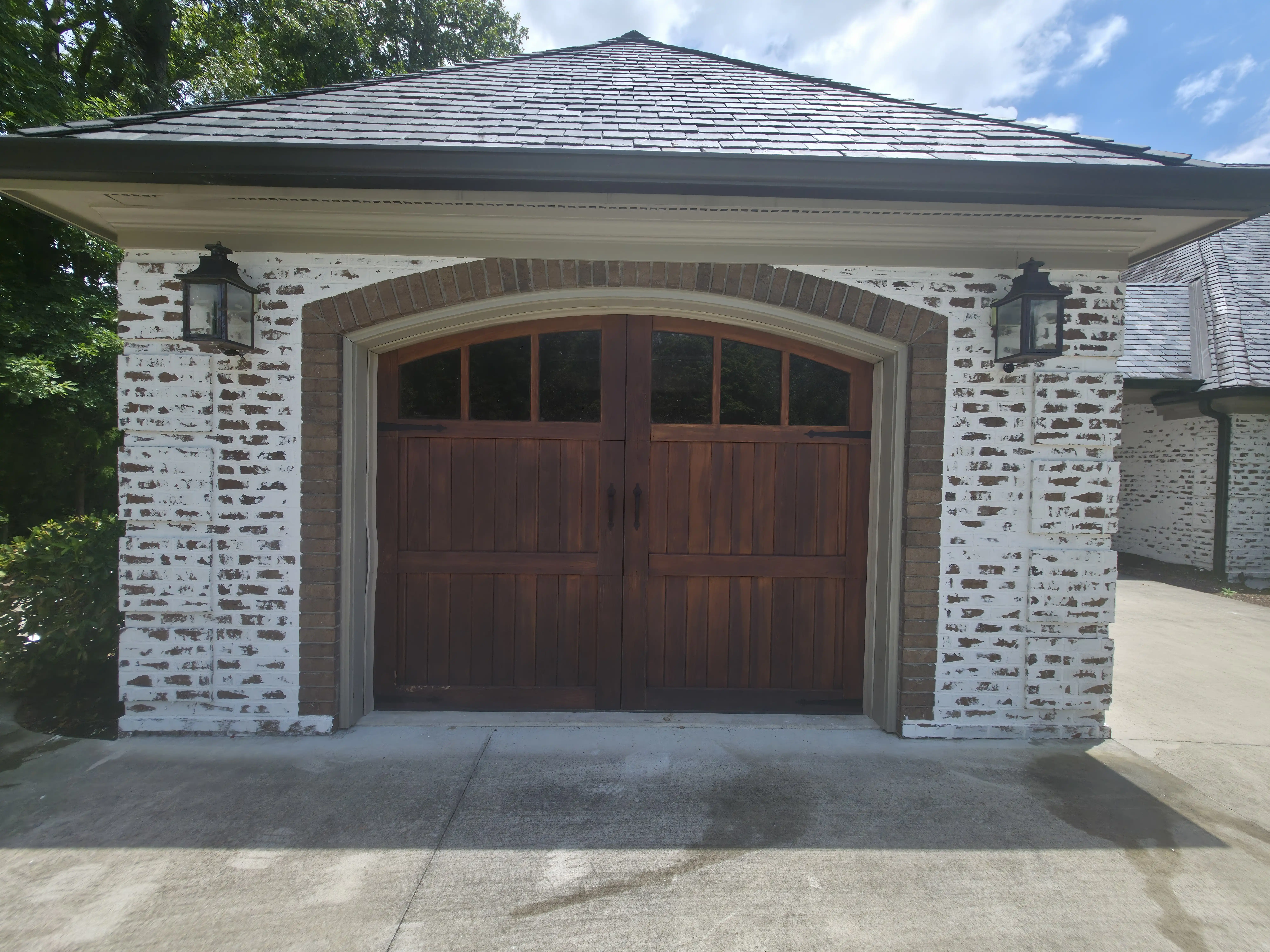 Brick residence completed with a clean hand developed German Smear finish
