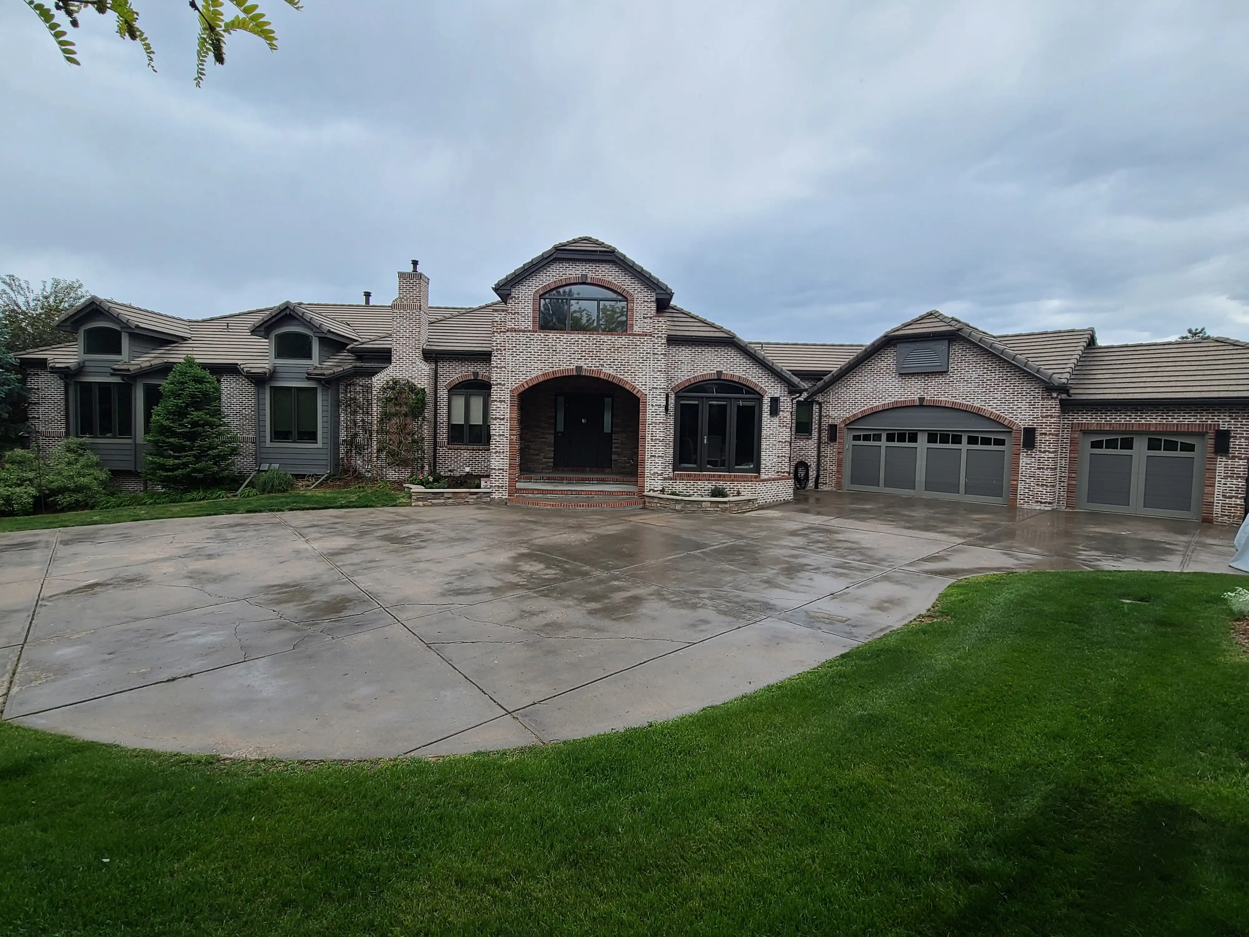 Traditional German Smear across the broad brick exterior of a Denver residence